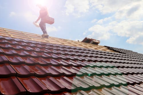 Close-up of newly installed severe-weather resistant shingles on residential roof